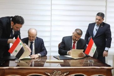 el-ministro-sirio-del-interior-muhammad-al-rahmoun-y-su-homologo-iraqui-abdul-amir-al-shammar